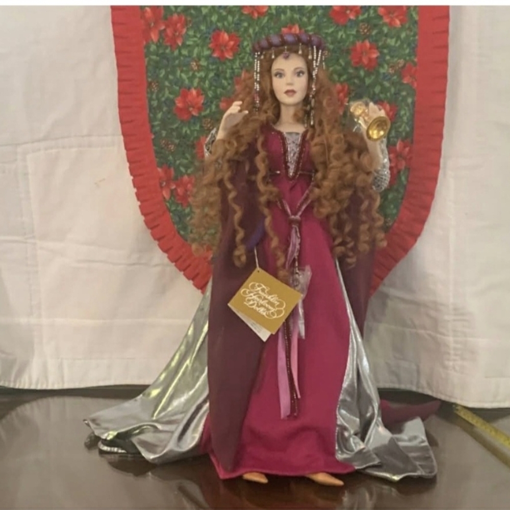 Franklin Mint Beautiful Collector Doll In A Magenta and Silver Dress.